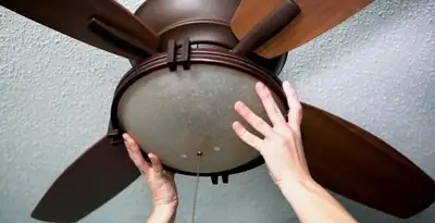 Ceiling fan repair and reinstallation on ceiling mount in San Francisco, CA
