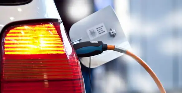 Electric car plugged into EV charger after professional installation in San Francisco, CA