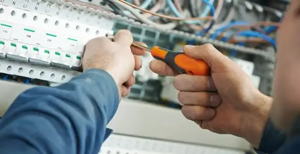 electrical service showing licensed electrician performing electrical panel maintenance and adjustments in San Francisco, CA