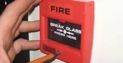 fire alarm installation service showing manual fire alarm pull station installed by licensed electricians in San Francisco, CA