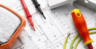 licensed electrician planning and testing electrical systems using professional tools in San Francisco, CA