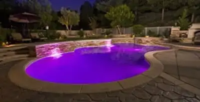 pool light installation and repair services illuminating a residential swimming pool in San Francisco, CA