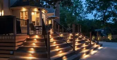 Residential electrician installing outdoor lighting for home safety in San Francisco, CA