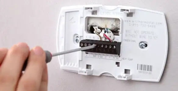 Thermostat installation service with proper wiring and secure wall mounting in San Francisco, CA